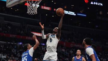 Jan 3, 2022; Los Angeles, California, USA; Minnesota Timberwolves forward Jarred Vanderbilt (8) shoots the ball against the LA Clippers in the second half at Crypto.com Arena. Mandatory Credit: Kirby Lee-USA TODAY Sports