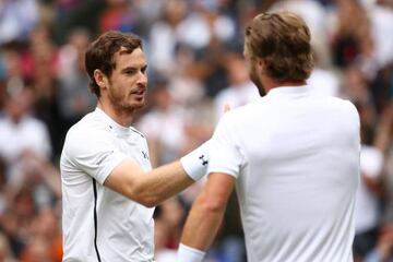 Murray and Broady shake hands after the British number one's straight sets victory.