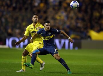 Mario Gaspar y Cristian Pavón.