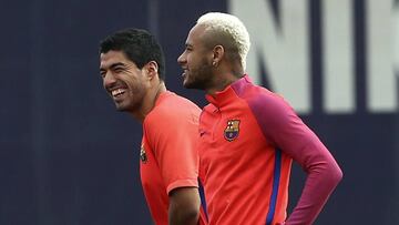Neymar, junto a Luis Suárez.