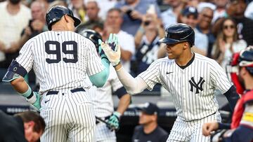 Jun 22, 2024; Bronx, New York, USA; New York Yankees center fielder Aaron Judge (99) celebrates with right fielder Juan Soto (22) after hitting a two run home run against the Atlanta Braves in the first inning at Yankee Stadium. Mandatory Credit: Wendell Cruz-USA TODAY Sports
