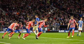 Los jugadores del Atlético de Madrid celebran el 1-1 de Griezmann. 