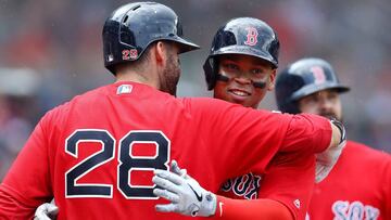 BOSTON, MASSACHUSETTS - AUGUST 18: Rafael Devers #11 of the Boston Red Sox celebrates with J.D. Martinez #28 after hitting a two run home run against the Baltimore Orioles during the seventh inning at Fenway Park on August 18, 2019 in Boston, Massachusetts.   Maddie Meyer/Getty Images/AFP
 == FOR NEWSPAPERS, INTERNET, TELCOS &amp; TELEVISION USE ONLY ==