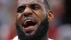 CHICAGO, IL - DECEMBER 04: LeBron James #23 of the Cleveland Cavaliers jaws with a Chicago Bulls fan during a game at the United Center on December 4, 2017 in Chicago, Illinois. The Cavaliers defeated the Bulls 113-91. NOTE TO USER: User expressly acknowledges and agrees that, by downloading and or using this photograph, User is consenting to the terms and conditions of the Getty Images License Agreement.   Jonathan Daniel/Getty Images/AFP
 == FOR NEWSPAPERS, INTERNET, TELCOS &amp; TELEVISION USE ONLY ==