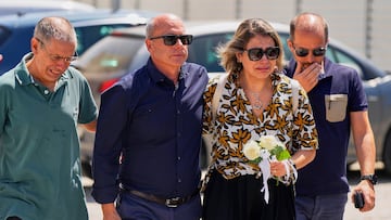Joaquim, center, father of Liverpool forward Diogo Jota and his brother, arrives accompanied by other relatives at a church where their bodies have been brought for a wake and funeral, in Gondomar, near Porto, Portugal, on Friday, July 4, 2025. (AP Photo/Manu Fernandez)