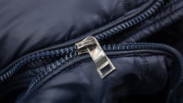 broken zipper lock. damaged zip closeup. fix cloth.
