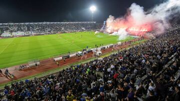 FILE PHOTO: Soccer Football - Serbian Cup Semi-Final - Partizan v Crvena Zvezda - Partizan Stadium, Belgrade, Serbia - June 10, 2020. Partizan fans throw flares during the match, after Serbian authorities allowed play with the audience following the outbr