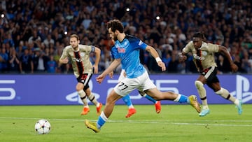 Soccer Football - Champions League - Group A - Napoli v Ajax Amsterdam - Stadio Diego Armando Maradona, Naples, Italy - October 12, 2022 Napoli's Khvicha Kvaratskhelia scores their third goal from the penalty spot REUTERS/Ciro De Luca