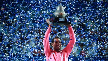 ACAPULCO, MEXICO - FEBRUARY 29: Rafael Nadal of Spain celebrates with the winner's trophy after winning the final singles match against Taylor Fritz of the United States during Day 6 of the ATP Mexican Open at Princess Mundo Imperial on February 29, 2020 in Acapulco, Mexico. (Photo by Hector Vivas/Getty Images)