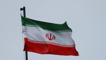 FILE PHOTO: A national Iranian flag waves in the wind over a building of the Iranian embassy, amid Russia's attack on Ukraine, in Kyiv, Ukraine September 24, 2022. REUTERS/Valentyn Ogirenko/File Photo