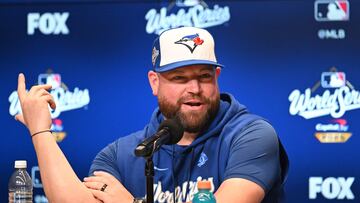 Oct 23, 2025; Toronto, ON, Canada; Toronto Blue Jays manager John Schneider (14) speaks to the media during media day and team workouts at Rogers Centre. Mandatory Credit: Dan Hamilton-Imagn Images
