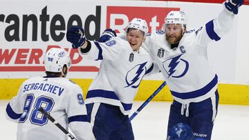 DENVER, COLORADO - JUNE 24: Ondrej Palat #18 of the Tampa Bay Lightning celebrates a goal with Steven Stamkos #91 and Mikhail Sergachev #98 of the Tampa Bay Lightning during the third period in Game Five of the 2022 NHL Stanley Cup Final against the Colorado Avalanche at Ball Arena on June 24, 2022 in Denver, Colorado.   Justin Edmonds/Getty Images/AFP
== FOR NEWSPAPERS, INTERNET, TELCOS & TELEVISION USE ONLY ==