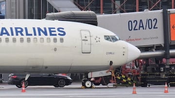 A car that was used by a man who drove through a barrier onto the grounds of the city's airport with a child, is parked next to a plane, in Hamburg, Germany, November 5, 2023. REUTERS/Fabian Bimmer