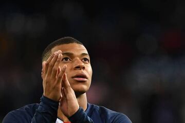 Respect | Paris Saint-Germain's French forward Kylian Mbappe applauds the Santiago Bernabeu.