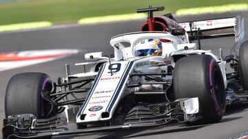 (FILES) In this file photo taken on October 26, 2018 Sauber's Swedish Marcus Ericsson races his car during the second free practice session of the Mexican Grand Prix at the Hermanos Rodriguez circuit in Mexico City. - Ericsson, never better than an e