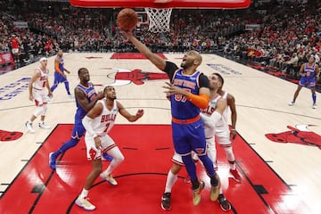 New York Knicks center Taj Gibson (67) goes to the basket against the Chicago Bulls during the first half at United Center.