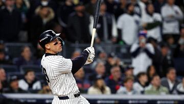 Oct 15, 2024; Bronx, New York, USA; New York Yankees outfielder Aaron Judge (99) hits a two run home run during the seventh inning against the Cleveland Guardians in game two of the ALCS for the 2024 MLB Playoffs at Yankee Stadium. Mandatory Credit: Wendell Cruz-Imagn Images