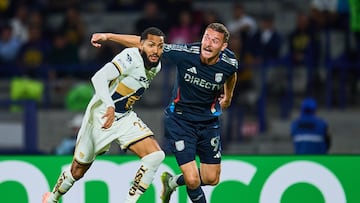 Olavio Vieira Dos Santos Junior Juninho (L) of Pumas fights for the ball with Christopher McVey (R) of San Diego during the round one second leg match between Pumas UNAM and San Diego FC as part of the CONCACAF Champions Cup 2026, at Olimpico Universitario Stadium on February 10, 2026 in Mexico City, Mexico.