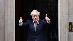 (FILES) In this file photo taken on October 23, 2020 Britain&#039;s Prime Minister Boris Johnson gestures as he meets with fundraisers for the Royal British Legion and service personnel, outside number 10 Downing Street as the British public is being urge