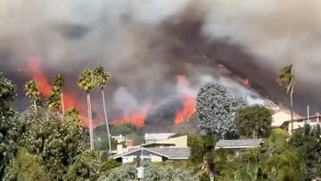 Wildfires erupt in Los Angeles as powerful windstorm hits Southern California