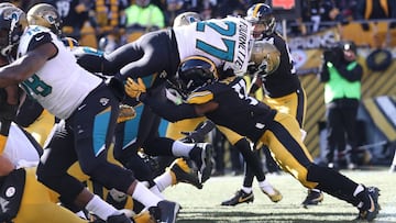 PITTSBURGH, PA - JANUARY 14: Leonard Fournette #27 of the Jacksonville Jaguars dives into the end zone for a touchdown against the Pittsburgh Steelers during the first half of the AFC Divisional Playoff game at Heinz Field on January 14, 2018 in Pittsburgh, Pennsylvania.   Rob Carr/Getty Images/AFP
 == FOR NEWSPAPERS, INTERNET, TELCOS &amp; TELEVISION USE ONLY ==