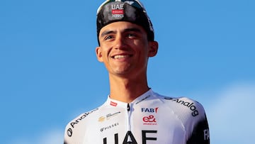 Second placed UAE Team Emirates XRG's Mexican rider Isaac Del Toro celebrates on the podium at the end of the 21st and last stage of the 108th Giro d'Italia cycling race of 143kms from Rome to Rome on June 1, 2025. (Photo by Luca Bettini / AFP)