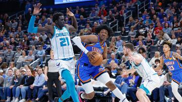 Mar 28, 2023; Oklahoma City, Oklahoma, USA; Oklahoma City Thunder forward Jalen Williams (8) drives to the basket against Charlotte Hornets forward JT Thor (21) during the second half at Paycom Center. Charlotte defeated Oklahoma City 137-134. Mandatory Credit: Alonzo Adams-USA TODAY Sports