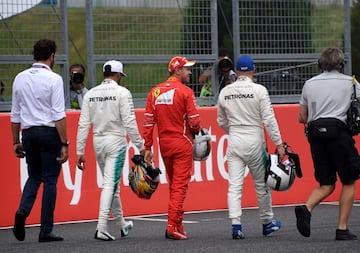 Lewis Hamilton, Sebastian Vettel y Valtteri Bottas tras terminar la calificación del GP de Japón.