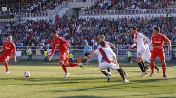 Real Madrid in red against Rayo in February 2012.
