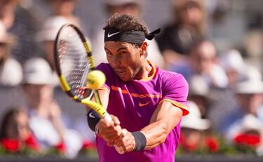 Nadal carves through Djokovic to reach Madrid Open final