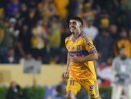 Tigres' Argentine midfielder #11 Juan Brunetta celebrates scoring his team's first goal during the Liga MX Apertura semifinal second leg football match between Tigres and Cruz Azul at the UANL University Stadium in San Nicolas de los Garza, Nuevo Leon State, Mexico on December 6, 2025. (Photo by Julio Cesar AGUILAR / AFP)