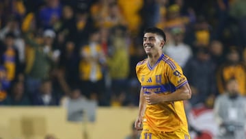 Tigres' Argentine midfielder #11 Juan Brunetta celebrates scoring his team's first goal during the Liga MX Apertura semifinal second leg football match between Tigres and Cruz Azul at the UANL University Stadium in San Nicolas de los Garza, Nuevo Leon State, Mexico on December 6, 2025. (Photo by Julio Cesar AGUILAR / AFP)