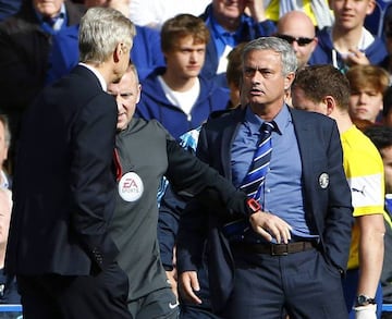 Mourinho at Chelsea and his Arsenal counterpart Arsene Wenger at Stamford Bridge in 2014.