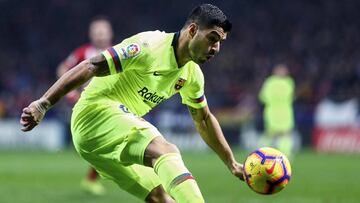Suárez, en el partido entre Atlético y Barcelona.