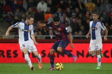 Luis Suárez y Salva Sevilla.