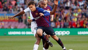 Soccer Football - La Liga Santander - FC Barcelona v Getafe - Camp Nou, Barcelona, Spain - May 12, 2019 Barcelona's Philippe Coutinho in action with Getafe's Dimitri Foulquier REUTERS/Susana Vera
