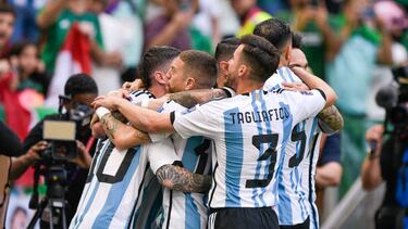 LUSAIL CITY, QATAR - NOVEMBER 22: Lionel Messi of Argentinia celebrates after scoring his sides first goal with Alejandro Gomez of Argentinia, Nicolas Tagliafico of Argentinia, Angel Di Maria of Argentinia and Leandro Paredes of Argentinia during the Group C - FIFA World Cup Qatar 2022 match between Argentina and Saudi Arabia at the Lusail Stadium on November 22, 2022 in Lusail City, Qatar (Photo by Pablo Morano/BSR Agency/Getty Images)
