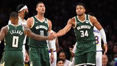 Milwaukee Bucks forward Giannis Antetokounmpo (34) celebrates with guard Damian Lillard (0) and center Brook Lopez (11) against the Los Angeles Lakers during the first quarter at Crypto.com Arena.