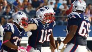 Julian Edelman, WR de New England Patriots, celebrando un TD con sus compañeros.