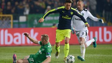 Arsenalx92s German midfielder Mesut Ozil drives the ball before scoring a goal during the UEFA Champions League Group A football match between PFC Ludogorets and Arsenal, on November 1, 2016 at the Vassil Levski stadium in Sofia. / AFP PHOTO / NIKOLAY DOYCHINOV