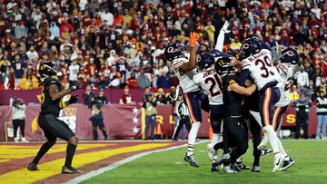 Oct 27, 2024; Landover, Maryland, USA; Washington Commanders wide receiver Noah Brown (85) catches a Hail Mary pass that was tipped with no time left to beat the Chicago Bears at Commanders Field. Mandatory Credit: Peter Casey-Imagn Images TPX IMAGES OF THE DAY