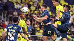 Sep 21, 2022; Nashville, Tennessee, US; Club America forward Federico Vinas (24) Nashville SC forward Ethan Zubak (11) and defender Ahmed Longmire (21) work for the ball on a corner kick during the second half at Geodis Park.