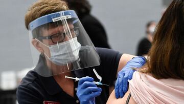 A nurse practitioner administers a dose of the Moderna Covid-19 vaccine at a clinic for Catholic school education workers including elementary school teachers and staff at a vaccination site at Loyola Marymount University (LMU) on March 8, 2021 in Los Ang