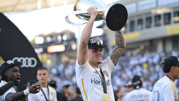Dec 7, 2024; Carson, California, USA; LA Galaxy forward Gabriel Pec (11) celebrates on the field with the Philip F. Anschutz trophy after defeating the New York Red Bulls in the 2024 MLS Cup at Dignity Health Sports Park. Mandatory Credit: Jayne Kamin-Oncea-Imagn Images