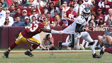 Sep 10, 2017; Landover, MD, USA; Philadelphia Eagles quarterback Carson Wentz (11) scrambles with the ball as Washington Redskins linebacker Zach Brown (53) chases in the fourth quarter at FedEx Field. The Eagles won 30-17. Mandatory Credit: Geoff Burke-USA TODAY Sports