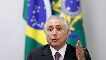 El presidente interino de Brasil, Michel Temer, durante una reuni&oacute;n con responsables de defensa sobre la seguridad en los Juegos de R&iacute;o.