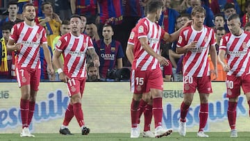 Los jugadores del Girona, durante un partido.
