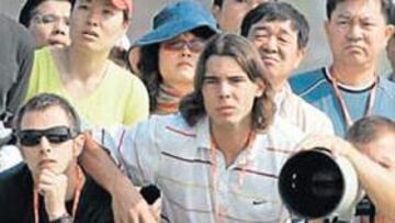 <b>TESTIGO DE EXCEPCIÓN. </b>Nadal siguió el recorrido de Tiger Woods en el masters de golf.