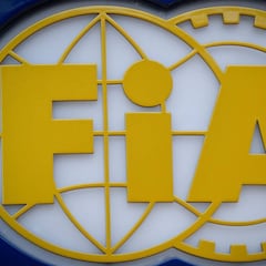 Why has the FIA decided to lower the age limit for issuing a super license?