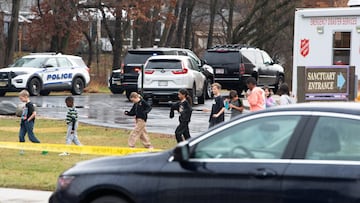 Children prepare to board a bus bound for the reunification center where they'll meet their parents after a shooting at Abundant Life Christian School in Madison, Wisconsin, U.S. December 16, 2024. REUTERS/Cullen Granzen